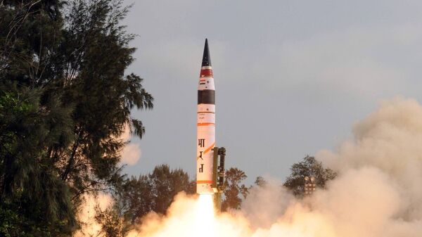 An Agni-V intercontinental ballistic missile - Sputnik India