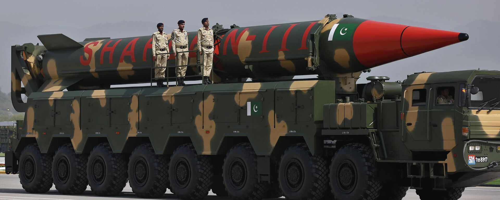 A Pakistani-made Shaheen-III missile, that is capable of carrying nuclear warheads, is carried on a trailer during a military parade in connection with Pakistan National Day celebrations, in Islamabad, Pakistan, Thursday, March 25, 2021. - Sputnik India, 1920, 19.01.2024