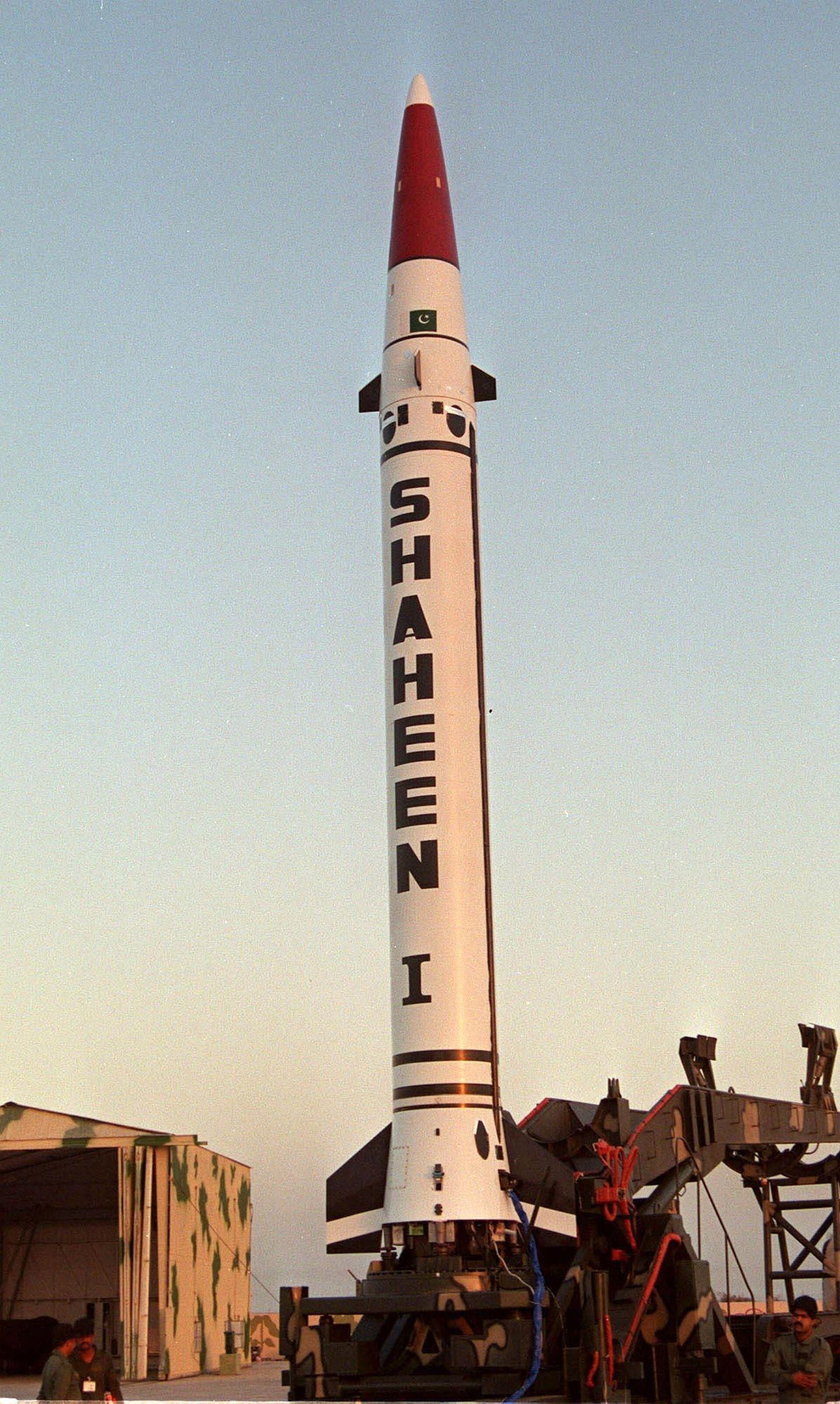 This October 8, 2002 file picture shows,  Shaheen I medium-range surface-to-surface missile sits on its launch pad in Baluchistan province in Pakistan. - Sputnik India, 1920, 16.12.2022