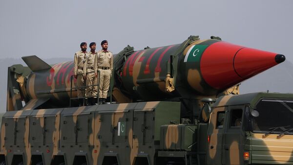 A Pakistani-made Shaheen-III missile, that is capable of carrying nuclear warheads, are displayed during a military parade to mark Pakistan National Day, in Islamabad, Pakistan, Wednesday, March 23, 2022. - Sputnik भारत