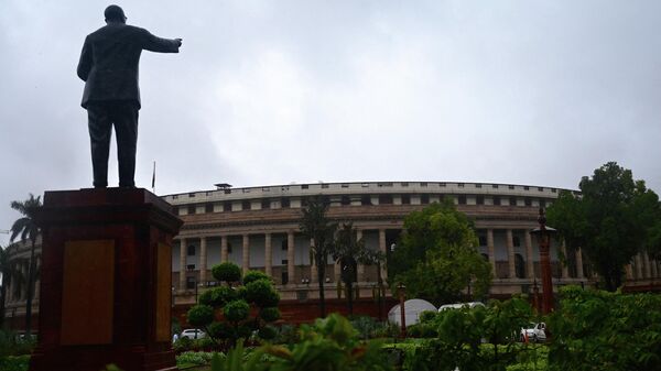 A general view of the Indian Parliament building is pictured before the beginning of the monsoon session of the Parliament in New Delhi on July 19, 2021.  - Sputnik India