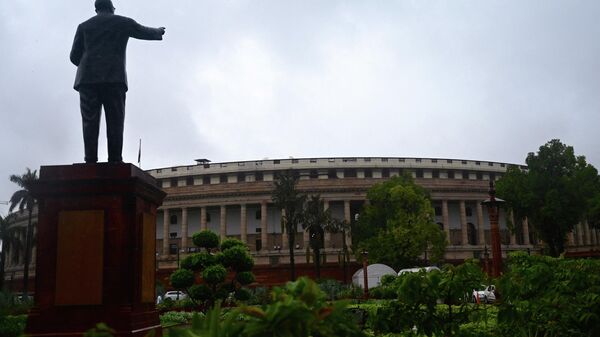 A general view of the Indian Parliament building is pictured before the beginning of the monsoon session on July 19, 2021.  - Sputnik India