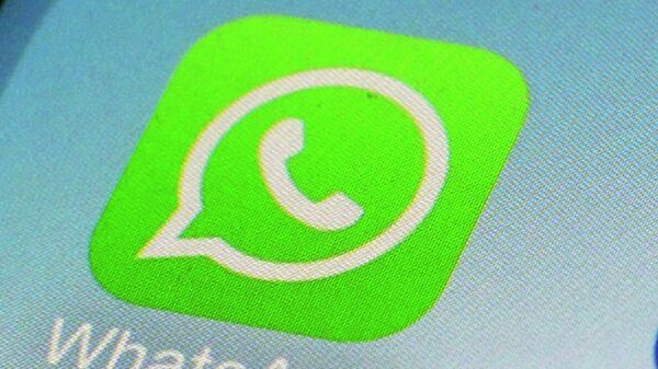 This Feb. 19, 2014, file photo, shows WhatsApp app icon on a smartphone in New York.   - Sputnik भारत