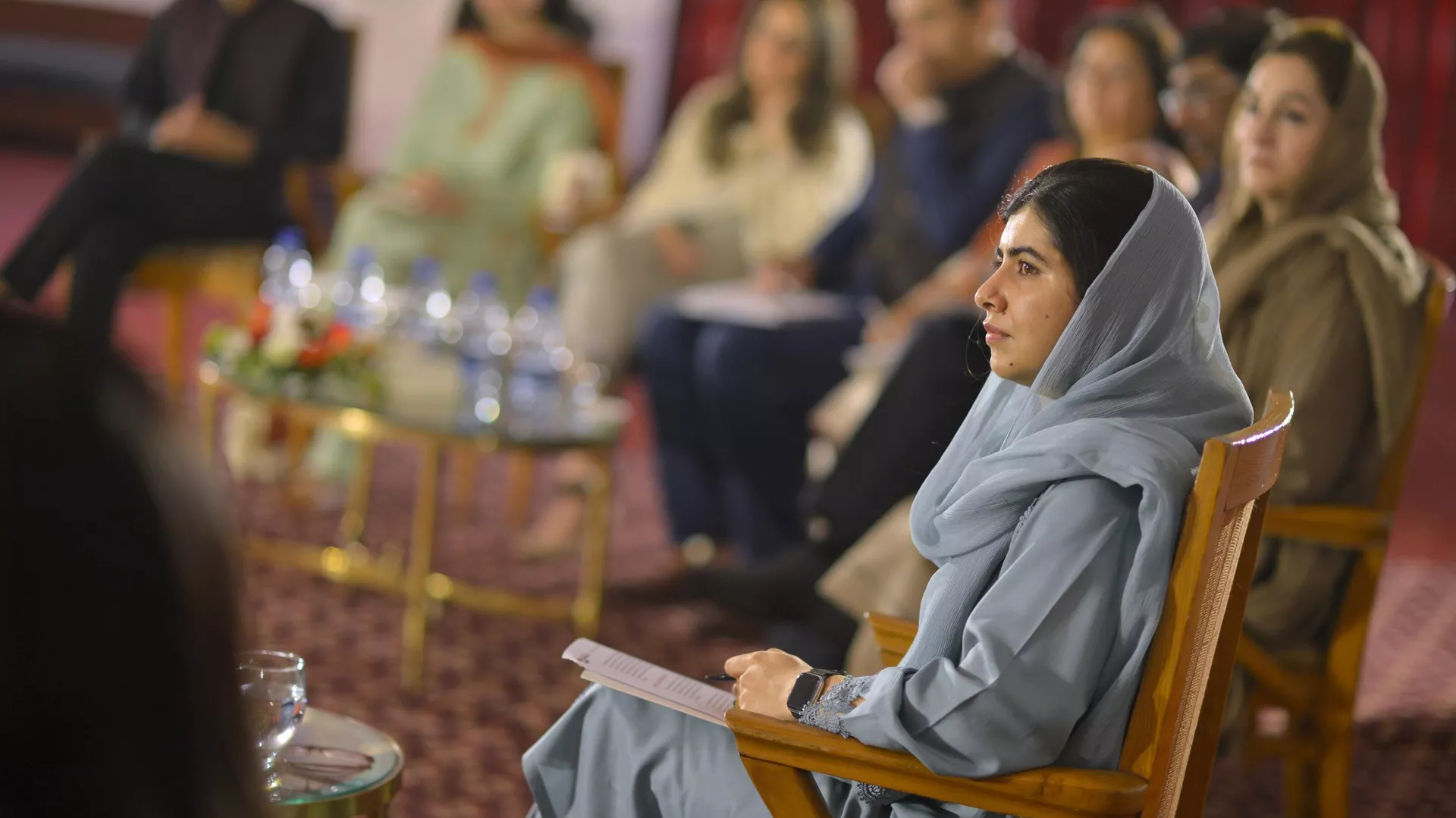 Malala Yousafzai meeting education activists and girls in Pakistan to discuss ways to improve education quality and access