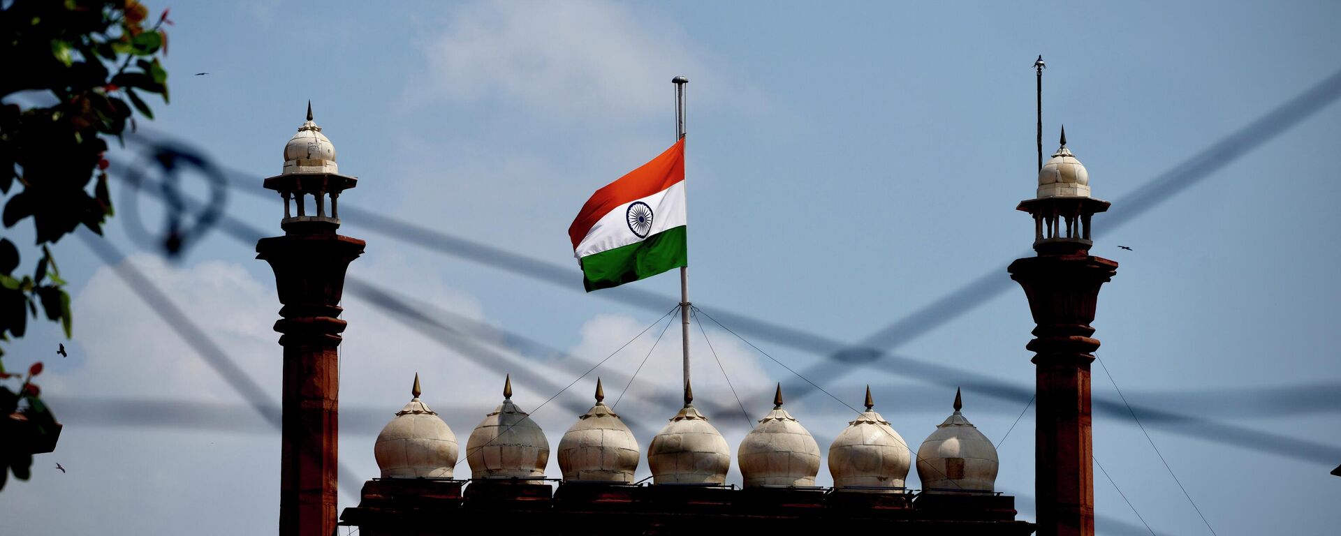 The Indian flag flies at half-mast at the historic Red Fort following Thursday’s death of Britain's Queen Elizabeth II in New Delhi, India, Sunday, Sept.11, 2022. - Sputnik India, 1920, 14.08.2023