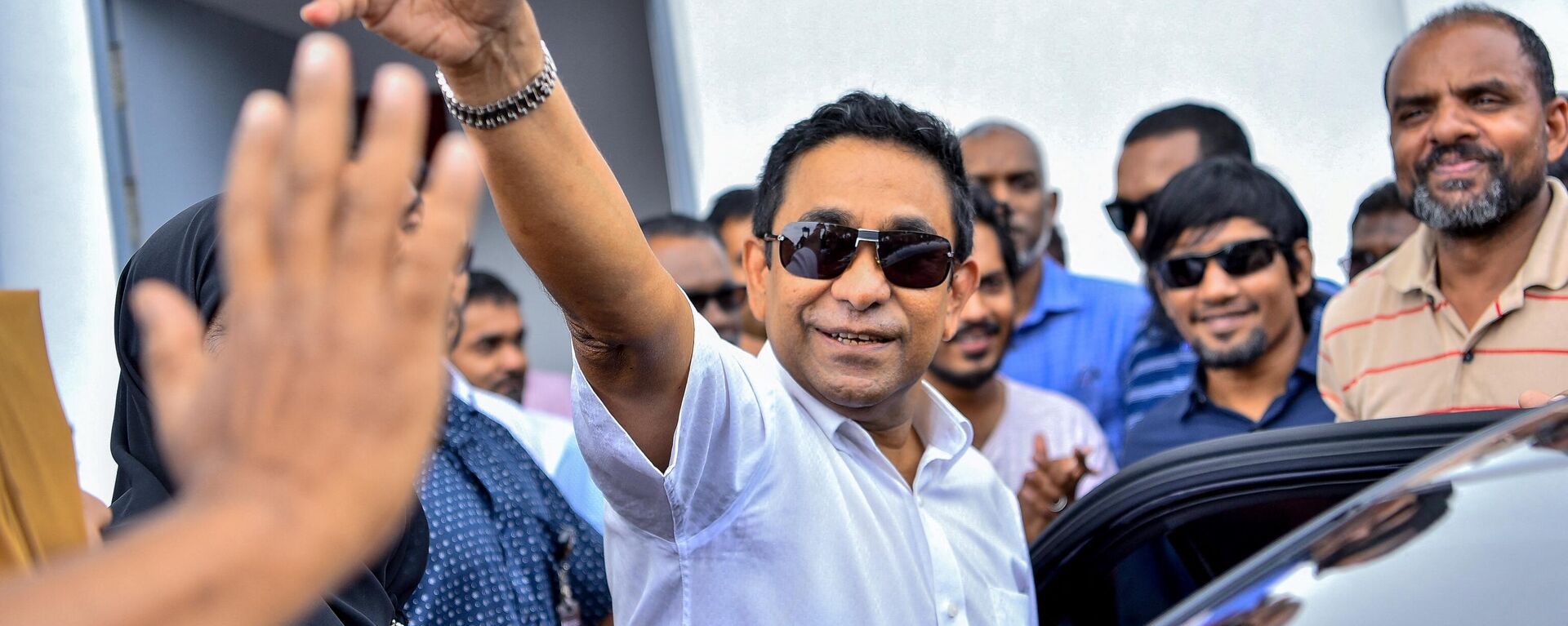 Maldives's former president Abdulla Yameen (C) arrives at a criminal court for his trial in Male on November 28, 2019. - Sputnik India, 1920, 26.12.2022