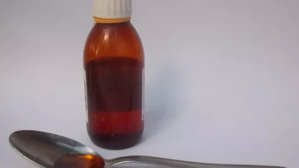 Cough syrup with tablespoon. - Sputnik भारत