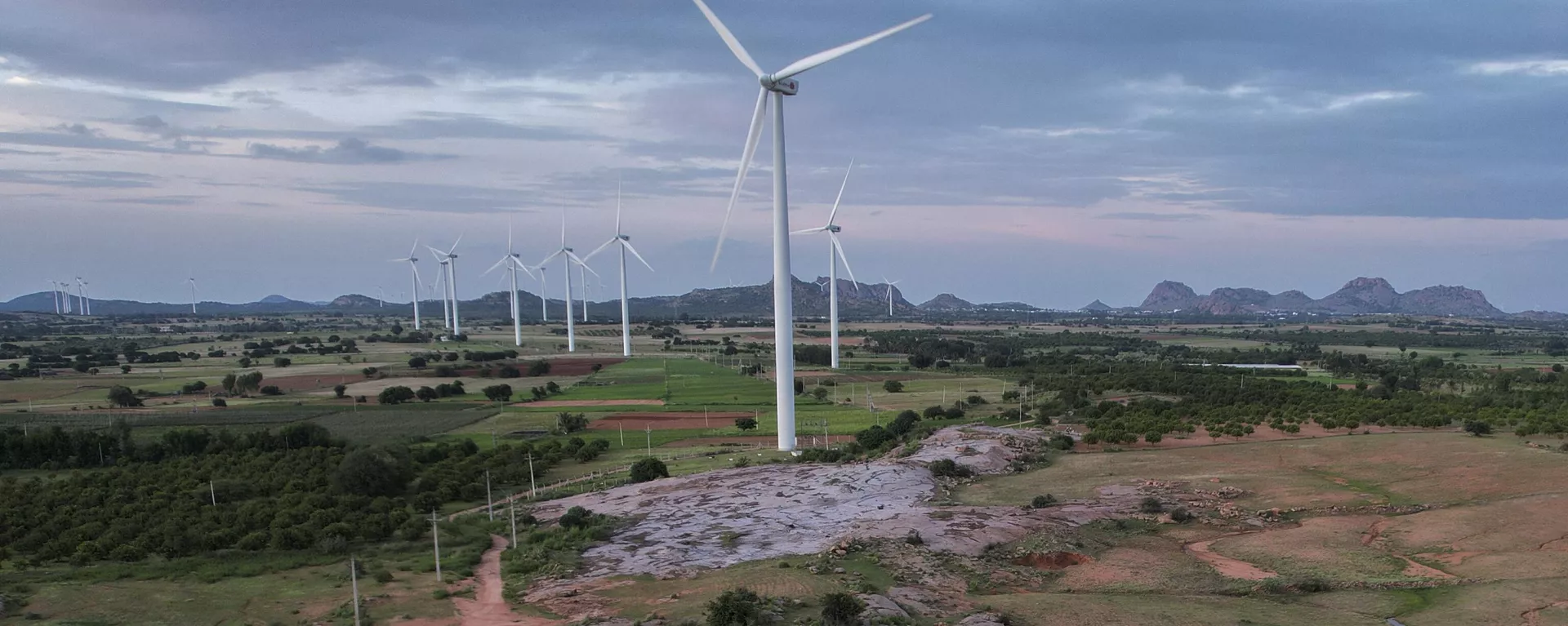 A windmill farm works in Anantapur district, Andhra Pradesh, India, Wednesday, Sept 14, 2022. - Sputnik India, 1920, 09.07.2023