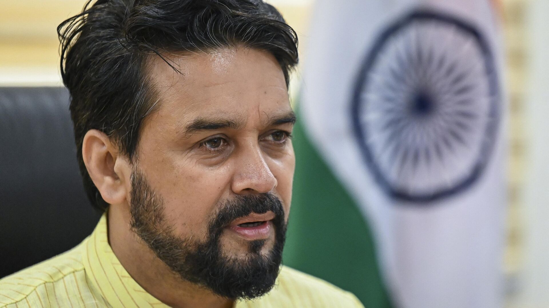 India's Minister of Youth Affairs and Sports Anurag Thakur speaks during a felicitation ceremony for the Indian medallists at the Tokyo Paralympic, in New Delhi on September 3, 2021. - Sputnik भारत, 1920, 28.12.2022