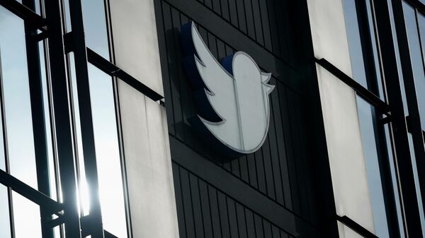 A Twitter logo hangs outside the company's offices in San Francisco, Monday, Dec. 19, 2022. - Sputnik India