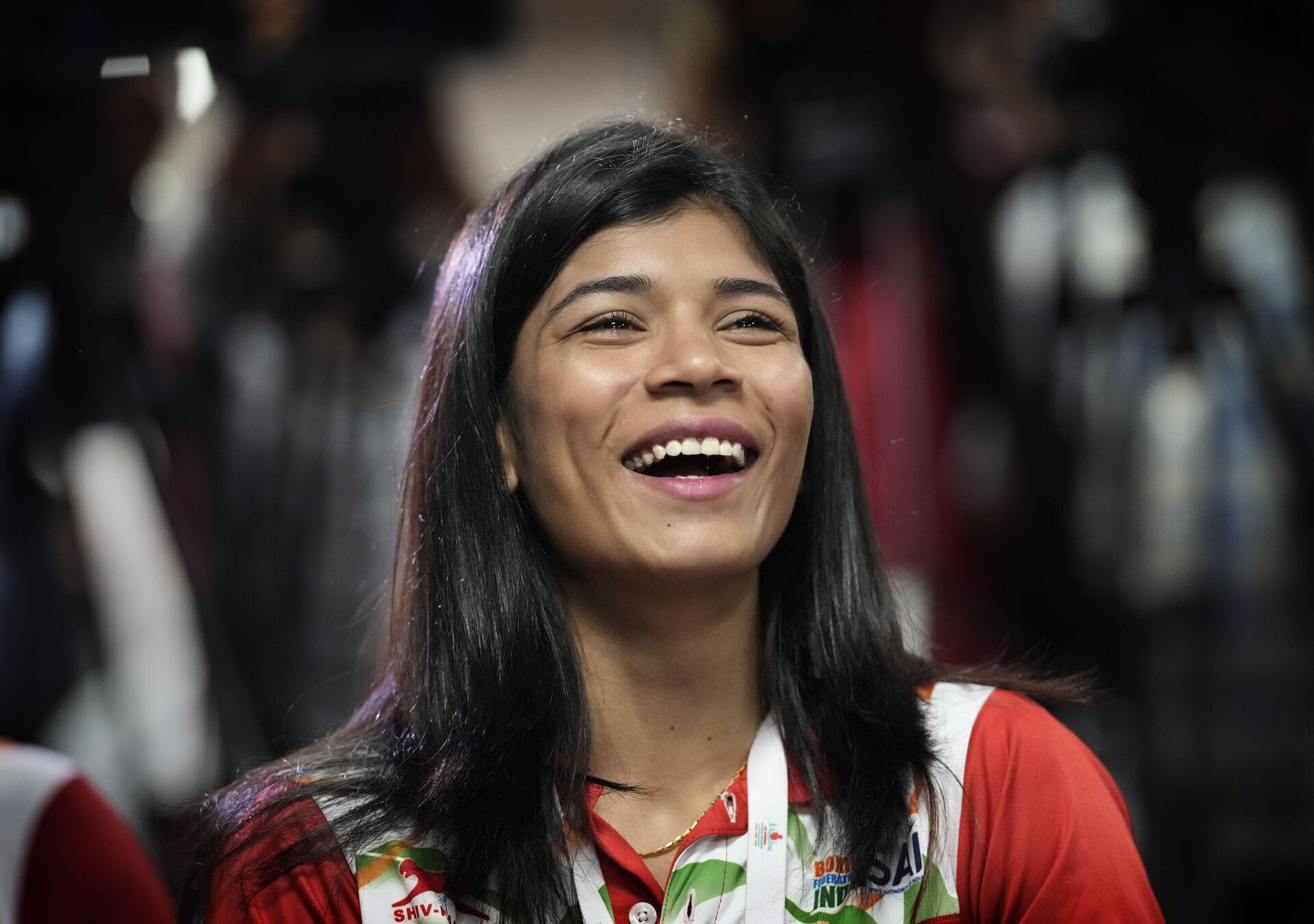 Indian boxer Nikhat Zareen, who won gold medal at the 2022 IBA Women's World Boxing Championships, laughs during a felicitation ceremony for Indian women boxing team in New Delhi, Tuesday, May 24, 2022. - Sputnik India, 1920, 30.12.2022