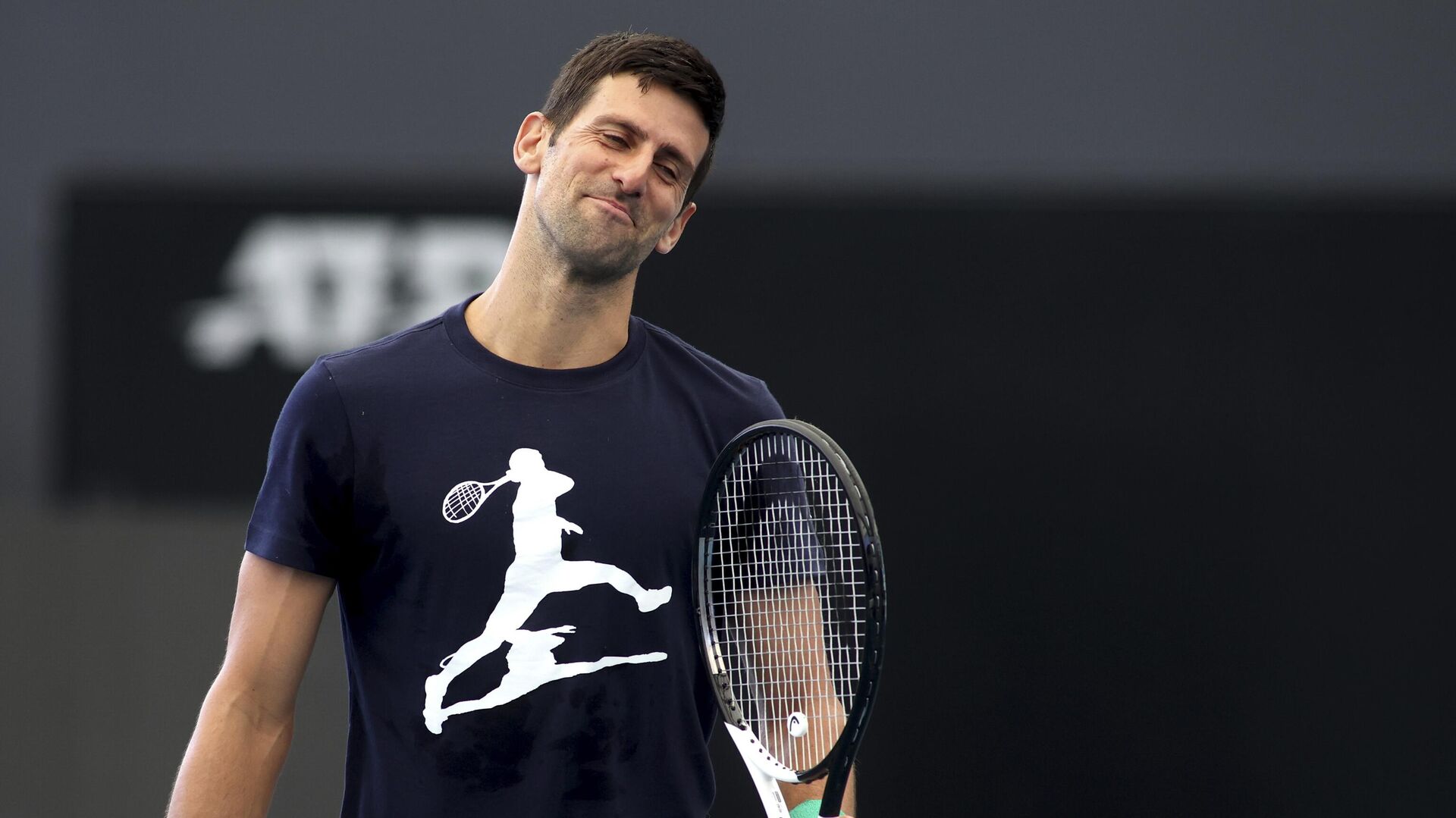 Serbia's Novak Djokovic reacts during a practice session ahead of the Adelaide International Tennis tournament in Adelaide, Australia, Thursday, Dec. 29, 2022. - Sputnik India, 1920, 29.01.2023