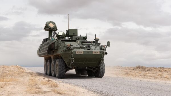 A 50-kilowatt-class laser mounted on a US Army Stryker vehicle , shown during a live-fire exercise at White Sands Missile Range in New Mexico. Part of the U.S. Army’s Directed Energy Maneuver-Short Range Air Defense, or DE M-SHORAD. - Sputnik भारत