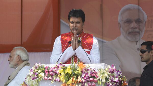Newly appointed Tripura Chief Minister Biplab Kumar Deb gestures during the swearing-in ceremony of Tripura legislative assembly at Assam Rifles ground in Agartala, the capital of northeastern state of Tripura on March 9, 2018 - Sputnik India
