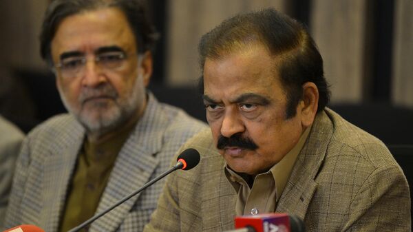 Pakistan Interior Minister Rana Sanaullah (R) speaks during a press conference in Islamabad on May 24, 2022 - Sputnik India