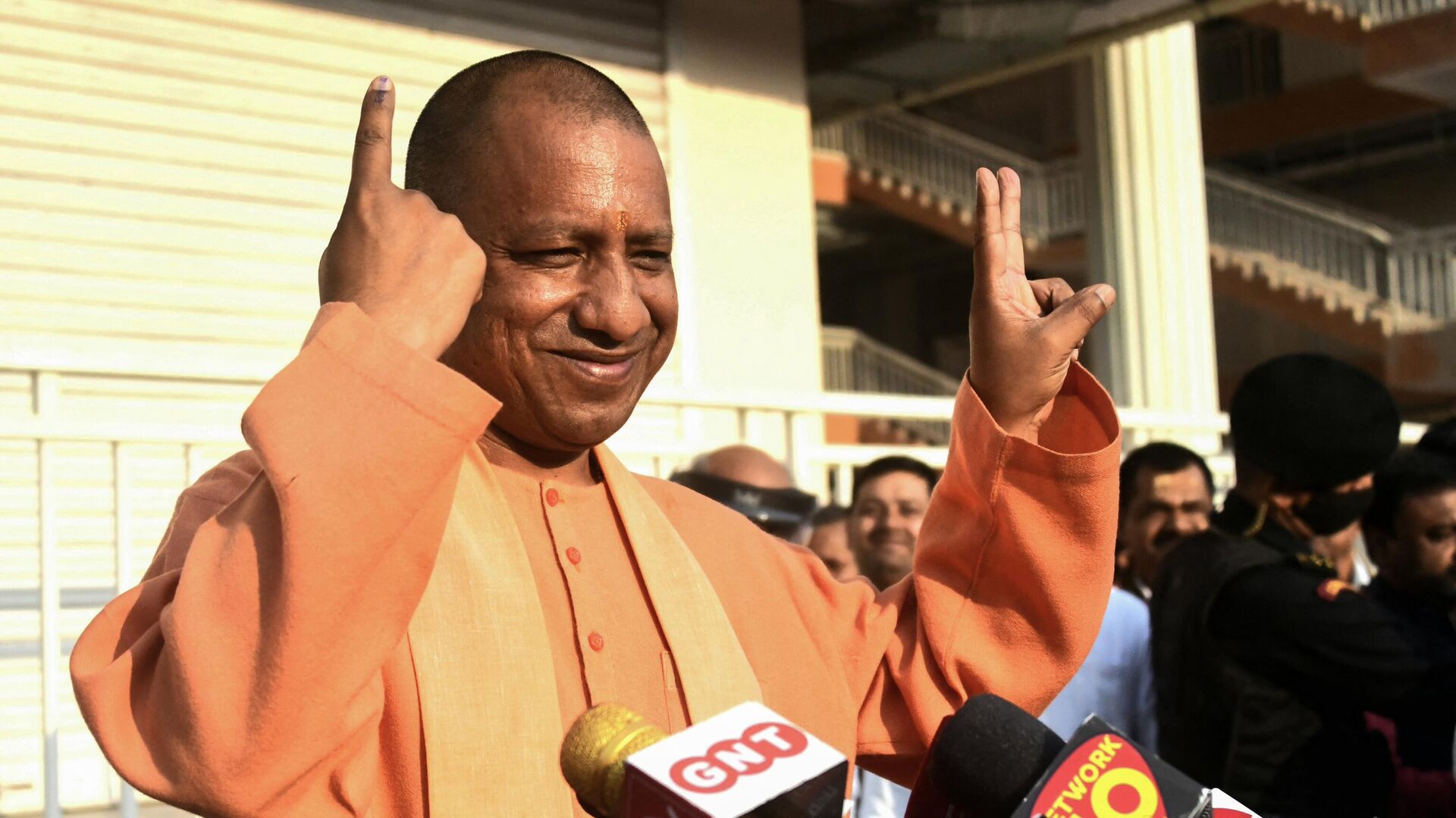 Uttar Pradesh Chief Minister Yogi Adityanath shows ink marked finger after casting his vote during the sixth phase of the Uttar Pradesh state assembly elections, in Gorakhpur on March 3, 2022. (Photo by AFP) - Sputnik India, 1920, 05.01.2023