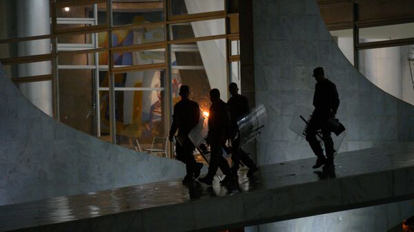 Security officers are seen patrolling Planalto Palace in Brasilia, Brazil, on January 8, 2023.  - Sputnik India