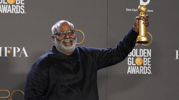 M.M. Keeravani poses in the press room with the award for best original song, motion picture for Naatu Naatu from RRR at the 80th annual Golden Globe Awards at the Beverly Hilton Hotel on Tuesday, Jan. 10, 2023, in Beverly Hills, Calif. - Sputnik India