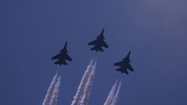 Indian Air Force's three Su 30 MKI fly in a Trishul formation above the ceremonial Rajpath boulevard during India's Republic Day celebrations in New Delhi, India, Wednesday, Jan. 26, 2022. - Sputnik India