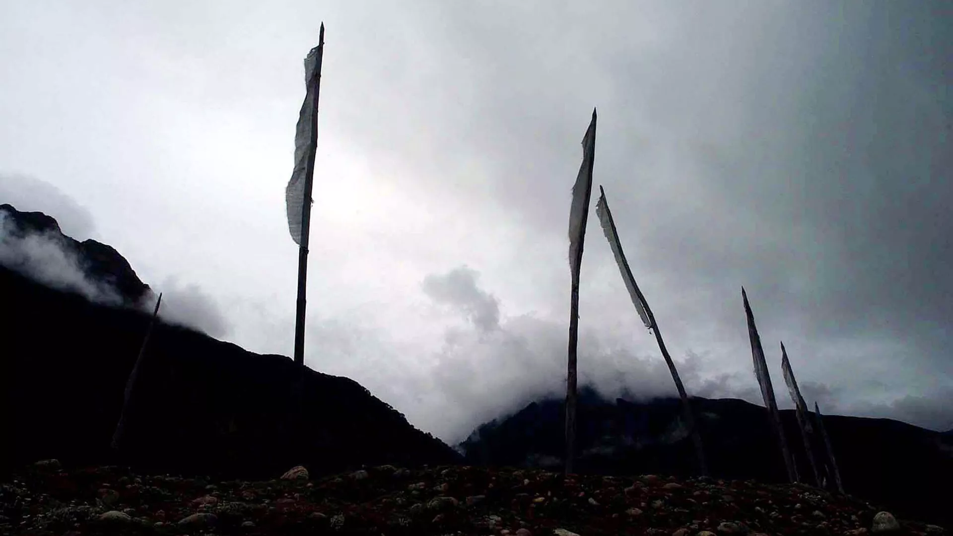 Religious flags are hoisted at the 1,000-year-old ruins in Xuba, Nyingchi region, southeastern Tibet, Monday, Aug. 16, 2004 in China.