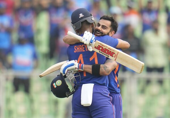 India's Shreyas Iyer hugs Virat Kohli after Kohli scored century during the third one-day international cricket match between India and Sri Lanka in Thiruvananthapuram, India, Sunday, Jan. 15, 2023. - Sputnik India