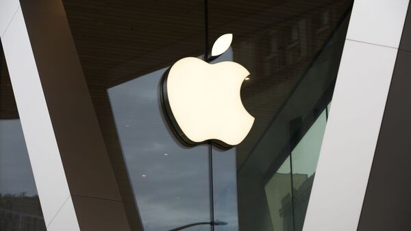 This Saturday, March 14, 2020 file photo shows an Apple logo on the facade of the downtown Brooklyn Apple store in New York. On Tuesday, Nov. 10, 2020 - Sputnik भारत
