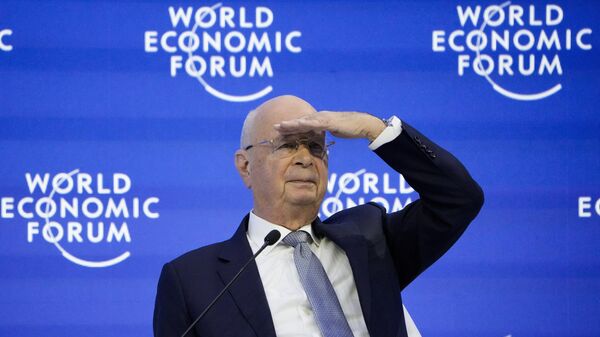 Klaus Schwab, President and founder of the World Economic Forum looks to the audience during a conversation with German Chancellor Olaf Scholz, at the World Economic Forum in Davos, Switzerland Wednesday, Jan. 18, 2023. - Sputnik भारत
