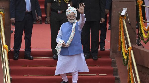 India's Prime Minister Narendra Modi gestures after addressing the nation from the ramparts of the Red Fort during the celebrations to mark country’s Independence Day in New Delhi on August 15, 2022. - Sputnik India