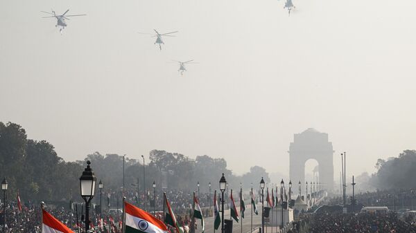Indian Air Force (IAF) helicopters fly past during the full dress rehearsal for the upcoming Republic Day parade, in New Delhi on January 23, 2023. - Sputnik भारत