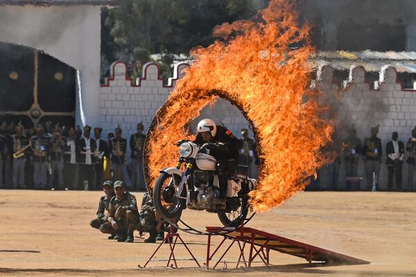 A member of the &#x27;Tornadoes&#x27; - a motorcycle stunt team belonging to Army Service Corps - performs during celebrations for India&#x27;s 74th Republic Day in Bengaluru on January 26, 2023. (Photo by Manjunath KIRAN / AFP) - Sputnik India