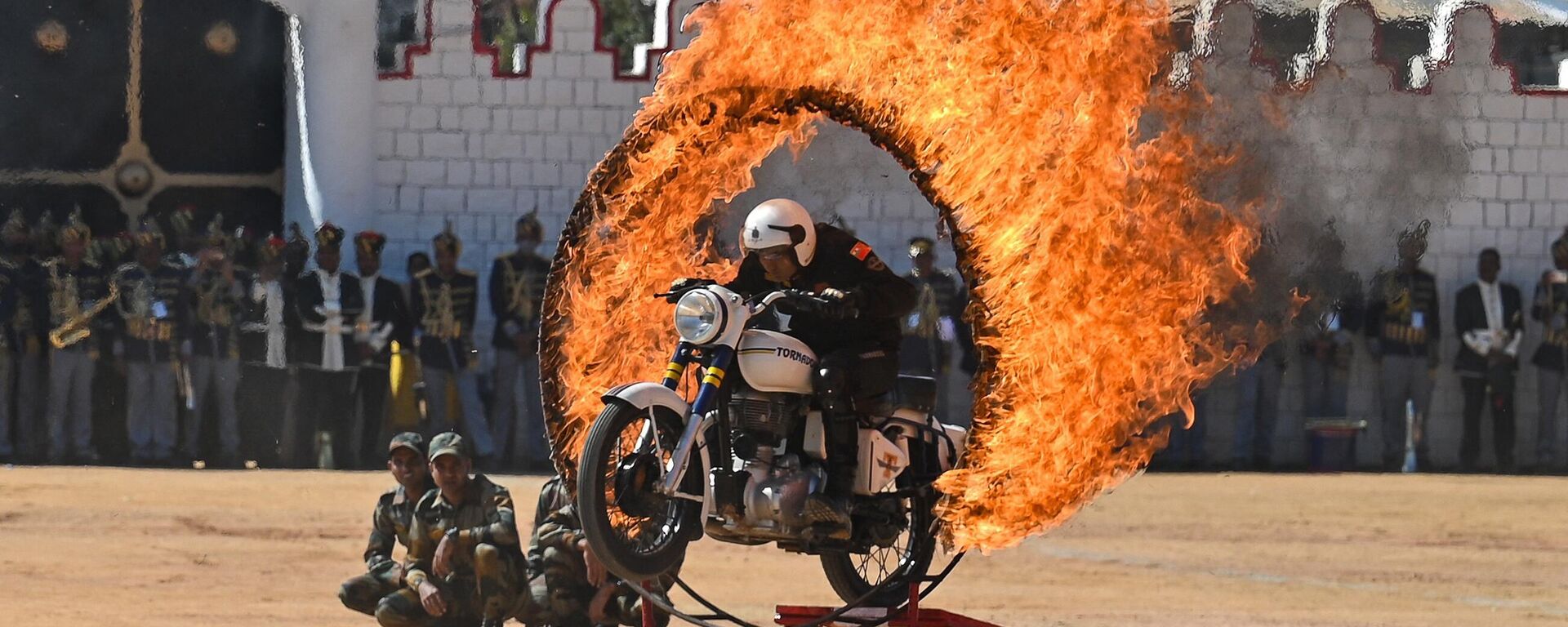 A member of the 'Tornadoes', a motorcycle stunt team belonging to Army Service Corps, performs during celebrations for the India's 74th Republic Day in Bengaluru on January 26, 2023. - Sputnik India, 1920, 26.01.2023