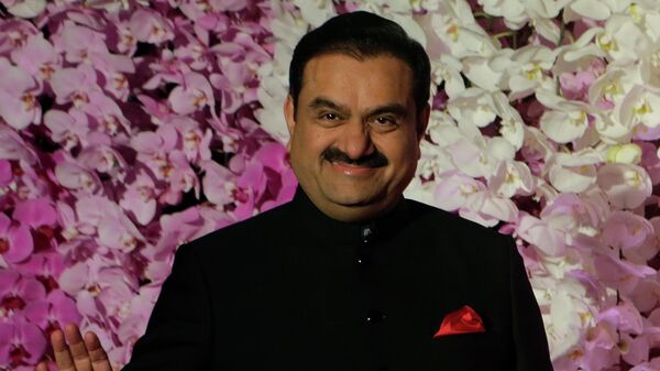 Chairman of Adani Group Gautam Adani poses during Akash Ambani's wedding reception in Mumbai, India, Sunday, March. 10, 2019 - Sputnik India