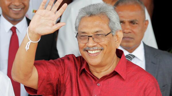 Then-Sri Lankan presidential candidate Gotabaya Rajapaksa waves to media as he leaves the election commission after filing his nomination in Colombo, Sri Lanka, Monday, Oct. 7, 2019. Former Sri Lanka President Rajapaksa, who fled his country last month during anti-government unrest and then resigned his position, is expected to visit Thailand, a Thai official said Wednesday, Aug. 10, 2022.  - Sputnik India