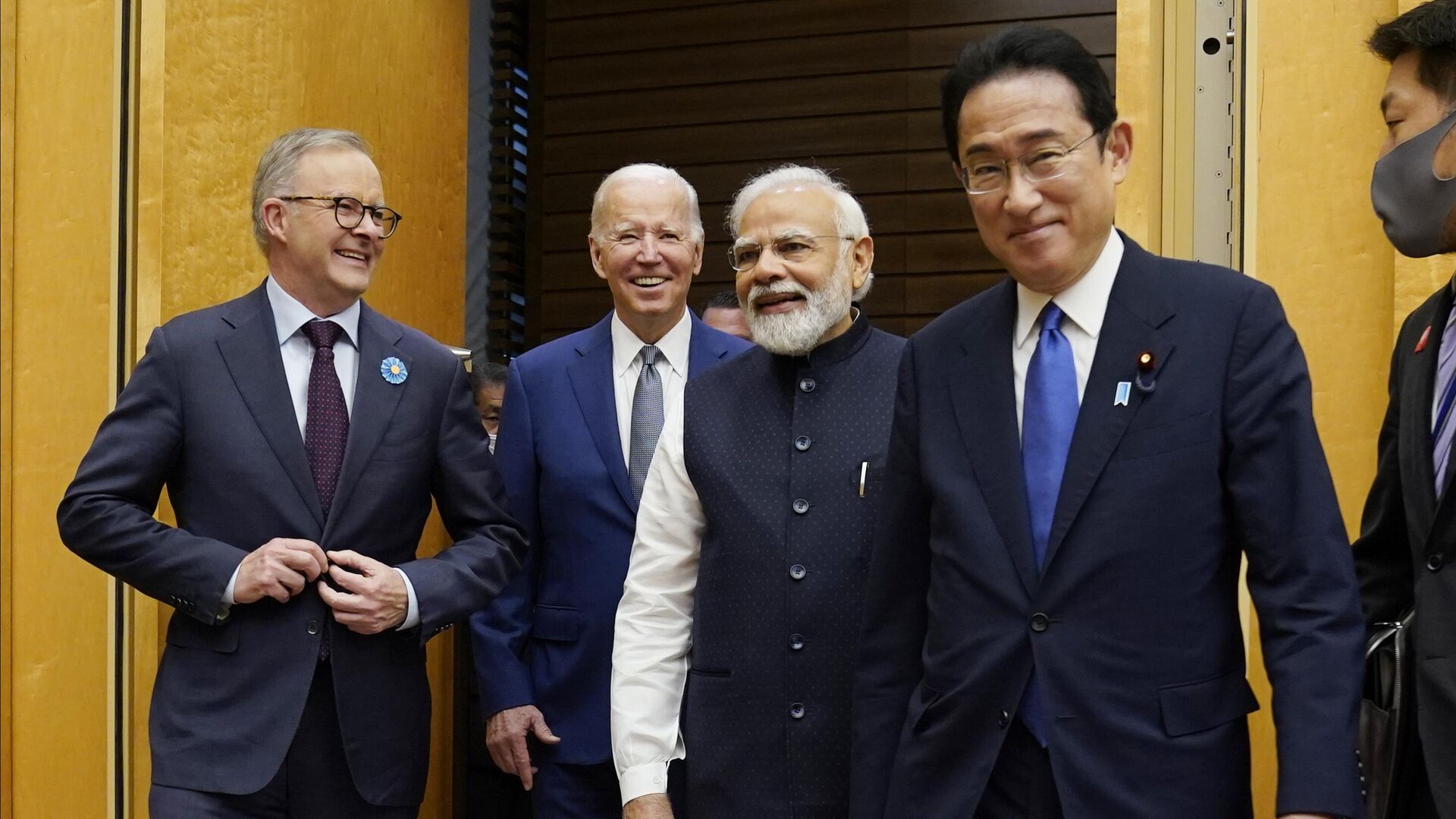 Australian Prime Minister Anthony Albanese, left, U.S. President Joe Biden, Indian Prime Minister Narendra Modi are greeted by Japanese Prime Minister Fumio Kishida, right, during his arrival to the Quad leaders summit at the prime minister's official residence, Tuesday, May 24, 2022, in Tokyo. - Sputnik India, 1920, 17.05.2023
