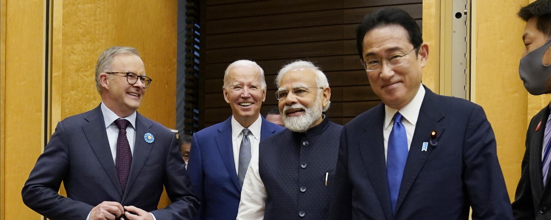 Australian Prime Minister Anthony Albanese, left, U.S. President Joe Biden, Indian Prime Minister Narendra Modi are greeted by Japanese Prime Minister Fumio Kishida, right, during his arrival to the Quad leaders summit at the prime minister's official residence, Tuesday, May 24, 2022, in Tokyo. - Sputnik India, 1920, 17.05.2023