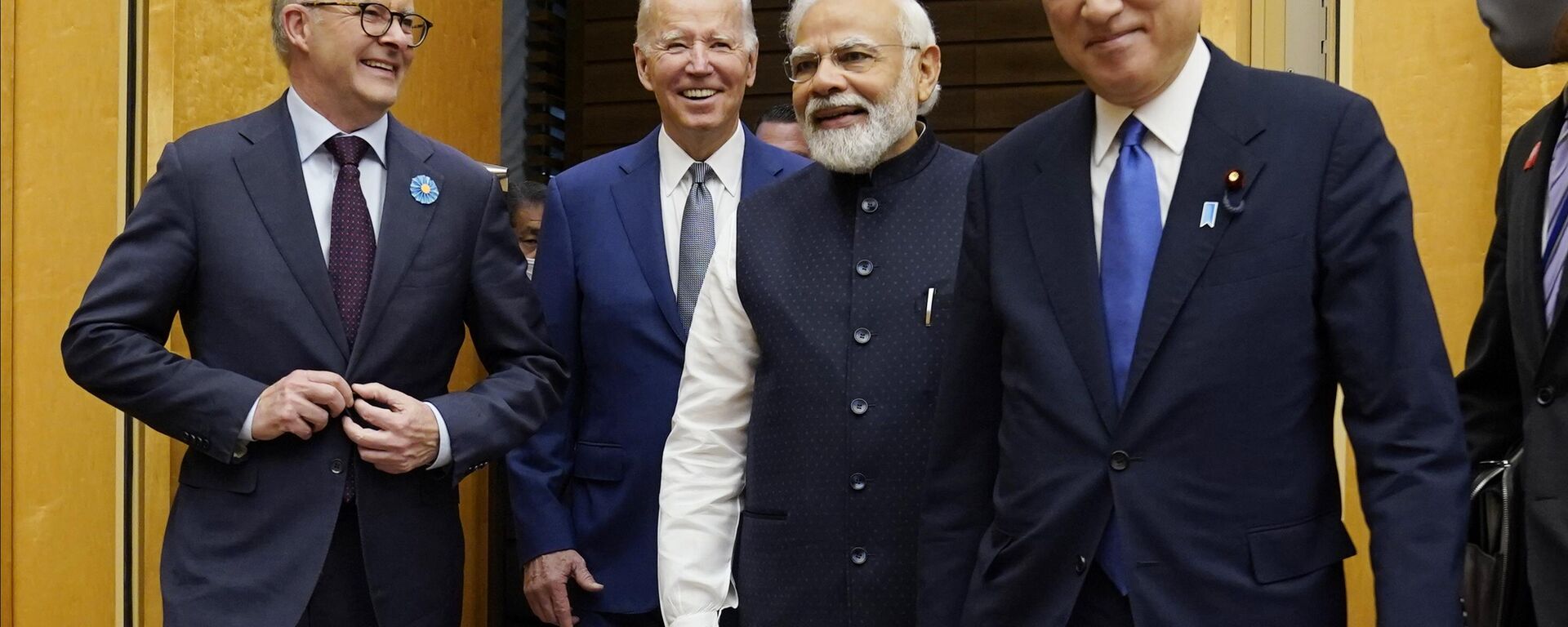 Australian Prime Minister Anthony Albanese, left, U.S. President Joe Biden, Indian Prime Minister Narendra Modi are greeted by Japanese Prime Minister Fumio Kishida, right, during his arrival to the Quad leaders summit at the prime minister's official residence, Tuesday, May 24, 2022, in Tokyo. - Sputnik India, 1920, 08.02.2023