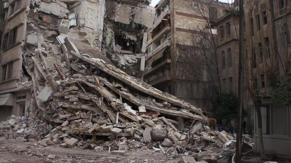 A residential building destroyed by a magnitude 7.8 earthquake that occurred on February 6 is seen in Aleppo, Syria - Sputnik India