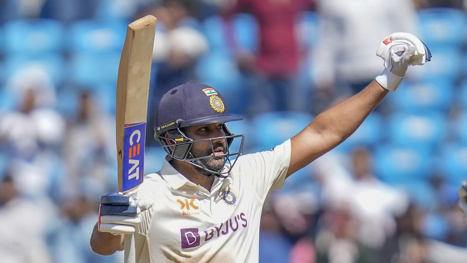 India's captain Rohit Sharma raises his bat to celebrate scoring a century during the second day of the first cricket test match between India and Australia in Nagpur, India, Friday, Feb. 10, 2023. - Sputnik भारत, 1920, 01.09.2023