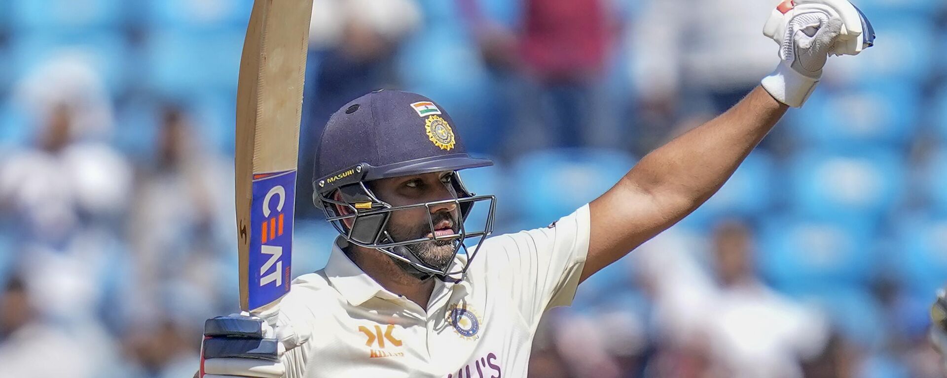 India's captain Rohit Sharma raises his bat to celebrate scoring a century during the second day of the first cricket test match between India and Australia in Nagpur, India, Friday, Feb. 10, 2023. - Sputnik भारत, 1920, 01.09.2023