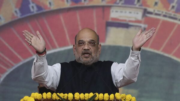 Indian Home Minister Amit Shah speaks during the inauguration of Narendra Modi Stadium in Ahmedabad, India, Wednesday, Feb. 24, 2021. The stadium was previously known as the Sardar Patel Gujarat Stadium. - Sputnik भारत