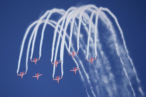 Indian Air Force's aerobatic team Suryakiran perform maneuvers on the first day of the Aero India 2023 at Yelahanka air base in Bengaluru, India, Monday, Feb. 13, 2023. - Sputnik India