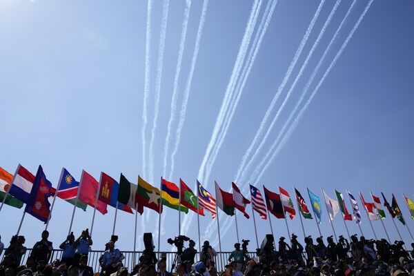 Flags of the participating countries are placed in a row during the inauguration of the Aero India 2023 at Yelahanka air base in Bengaluru, India, Monday, Feb. 13, 2023. - Sputnik India