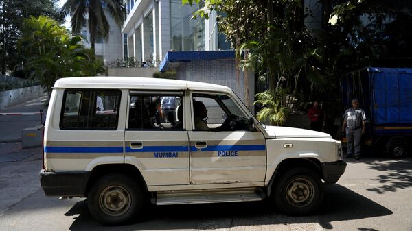 A police vehicle is seen parked at the gate of a building which houses BBC office, in Mumbai, India, Tuesday, Feb. 14, 2023. - Sputnik India
