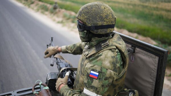 Russian serviceman is seen in the southern sector in the course of Russia's military operation in Ukraine, at the unknown location - Sputnik India