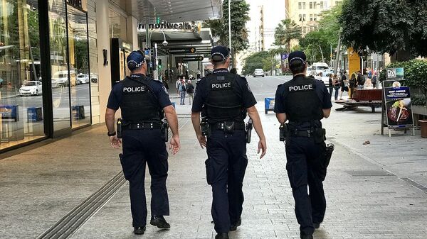 Police officers of Queensland Police Service, on the beat, in Brisbane Australia - Sputnik भारत