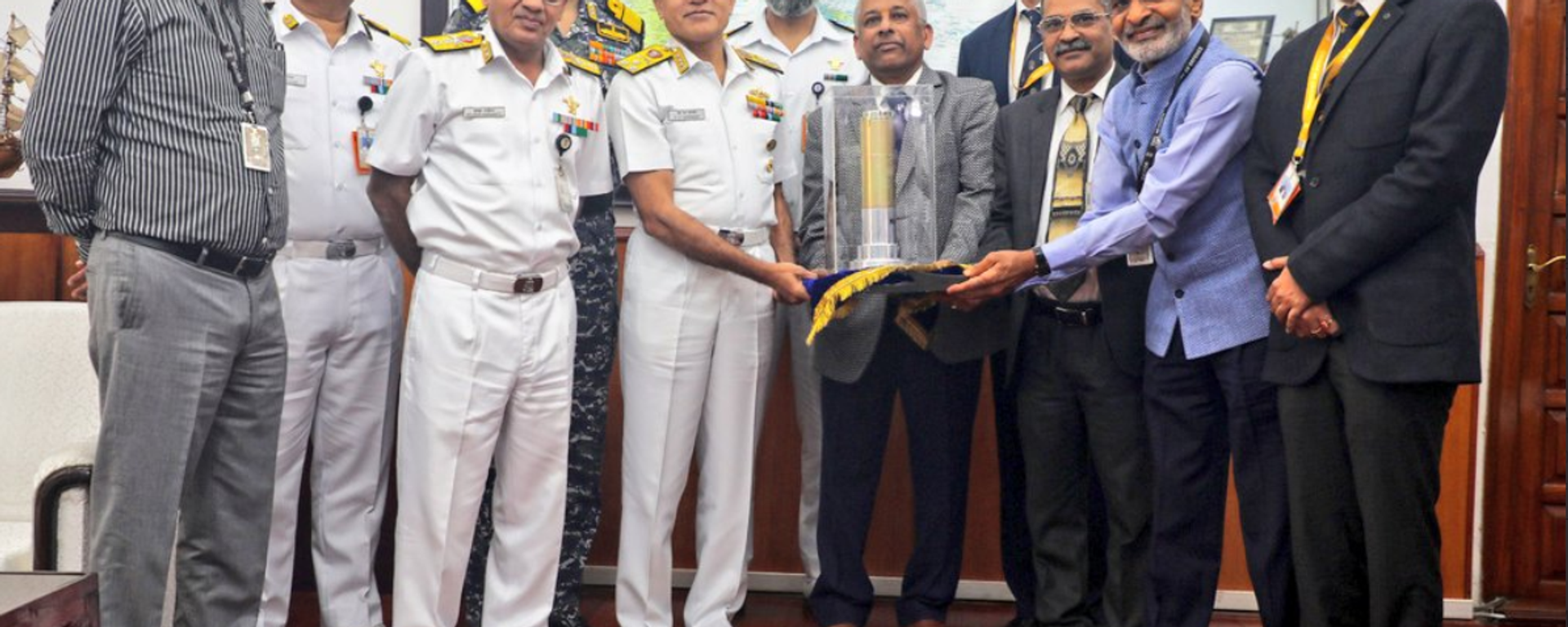 S.N. Nuwal, Chief Managing Director of Economic Explosives Ltd (EEL) hands over the first consignment of first-ever privately manufactured fully indigenized underwater Anti-Submarine Warfare (ASW) Rocket to Indian Navy Chief S.N. Ghormade. - Sputnik India, 1920, 04.03.2023