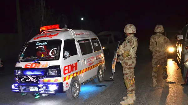 An ambulance carries injured officers to a hospital  - Sputnik भारत