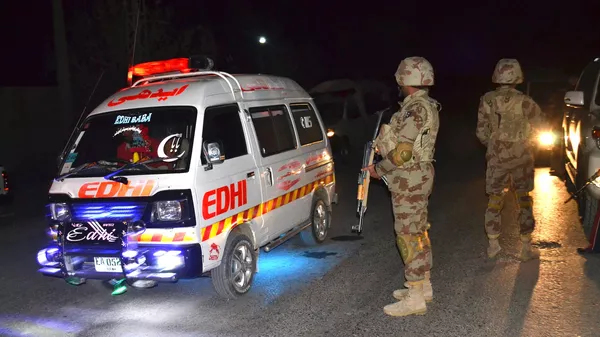 An ambulance carries injured officers to a hospital  - Sputnik भारत
