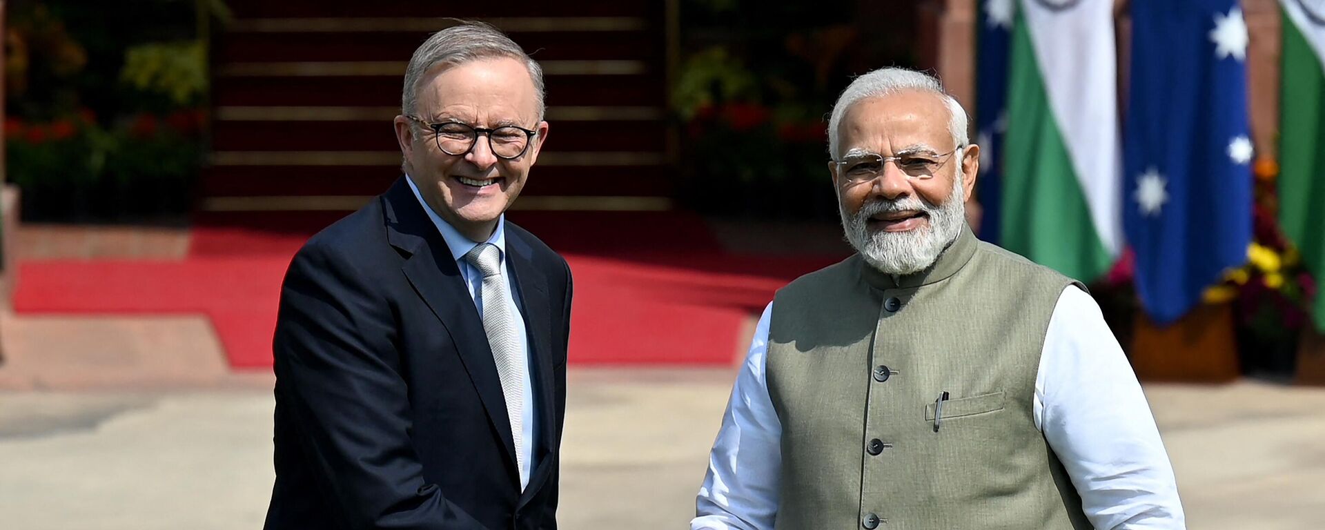 Indian Prime Minister Narendra Modi (R) shakes hands with Australia's Prime Minister Anthony Albanese before a meeting at Hyderabad House, in New Delhi on March 10, 2023.  - Sputnik India, 1920, 10.03.2023