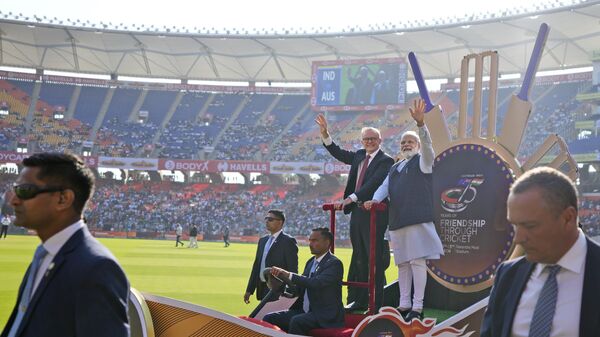 Indian Prime Minister Narendra Modi with his Australian counterpart Anthony Albanese wave as they arrive in the stadium to watch fourth cricket test match between India and Australia in Ahmedabad - Sputnik India